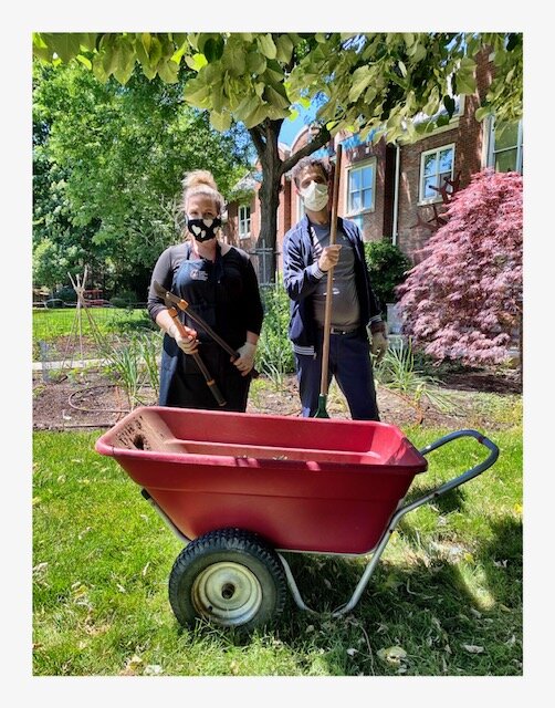 Janet and Mahmoud doing yardwork at RMH.jpg