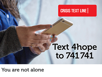 Woman holding phone with the text "Text 4hope to 741741"