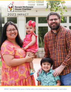 mother, father, son and daughter all posing for a picture. titled "2023 Impact" with RMHC NEO logo