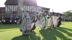 Golf Clubs lined up in front of clubhouse