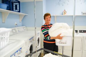 Barb Fisher doing laundry