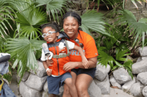 mother and son in rainforest exhibit at zoo