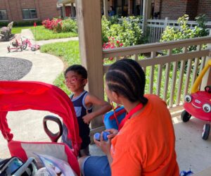 LJ playing with another person at Akron RMH